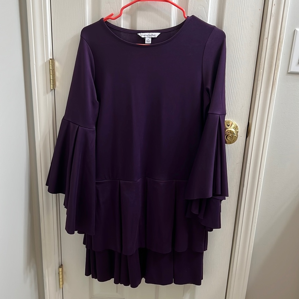 This is a very dark purple Children’s Chasing Fireflies formal dress
